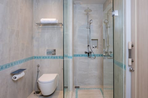 Shower, eco-friendly toiletries, hair dryer, bidet