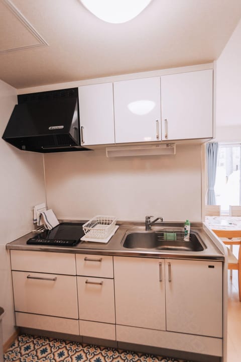 Apartment, 1 Bedroom | Private kitchenette | Fridge, microwave, stovetop, coffee/tea maker