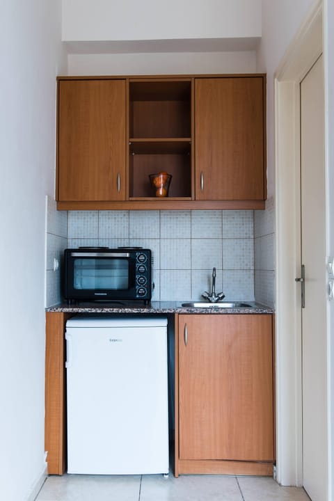 Mini-fridge, oven, stovetop, espresso maker