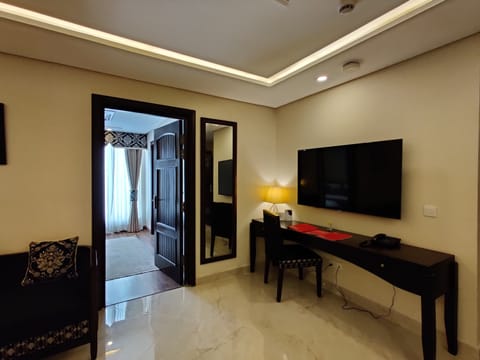 Royal Suite, Multiple Beds, Smoking | Living area | Flat-screen TV, heated floors