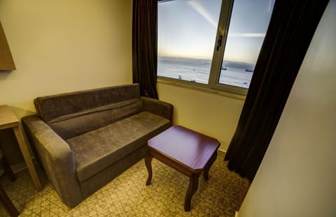 Comfort Double Room, Sea View | Living area | TV