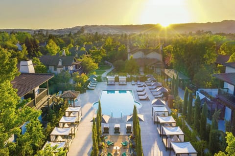 Outdoor pool, open 8 AM to 10 PM, cabanas (surcharge), pool umbrellas