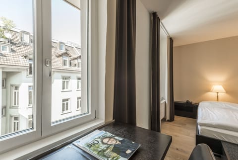 Quadruple Room | Premium bedding, in-room safe, desk, blackout drapes