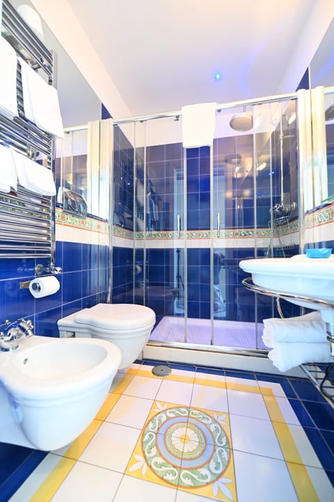 Double Room, Balcony, Sea View | Bathroom | Combined shower/tub, rainfall showerhead, free toiletries, hair dryer