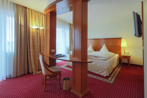 Junior Single Suite | Premium bedding, minibar, in-room safe, individually decorated