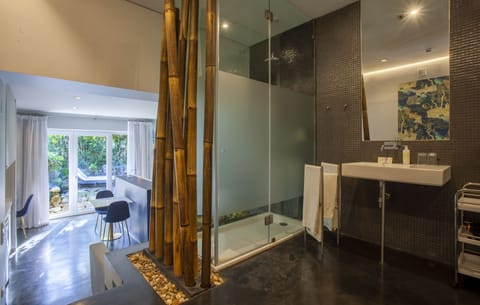 Junior Suite, Balcony (Kitchenette) | Bathroom | Combined shower/tub, free toiletries, hair dryer, towels