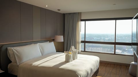 Grand Suite, 2 Bedrooms, River View | Minibar, in-room safe, desk, laptop workspace