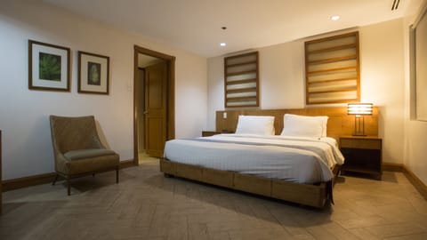 Deluxe Suite, Balcony | In-room safe, desk, iron/ironing board, bed sheets