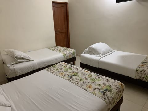 Quadruple Room | Blackout drapes, iron/ironing board, free WiFi, bed sheets