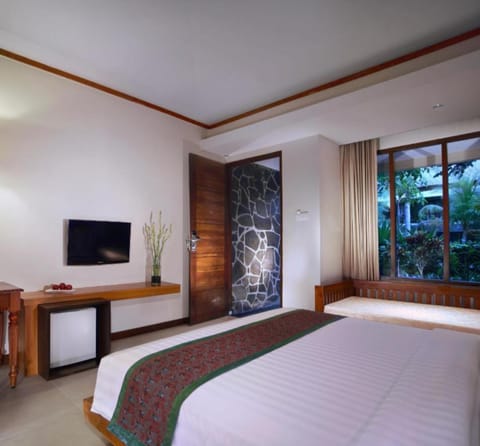 Deluxe Room, 1 Queen Bed, Pool View | In-room safe, desk, laptop workspace, soundproofing