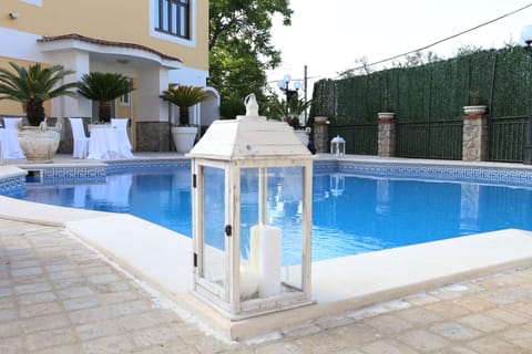 Outdoor pool, open 9 AM to 5 PM, sun loungers