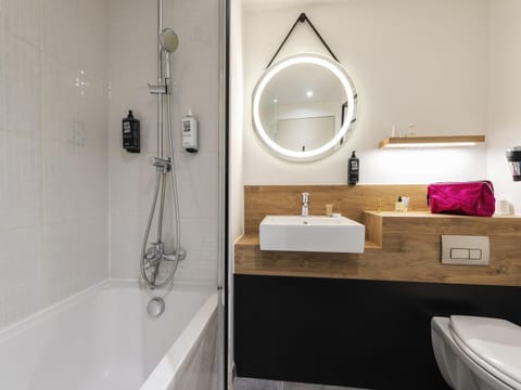 Premium bedding, desk, blackout drapes, soundproofing