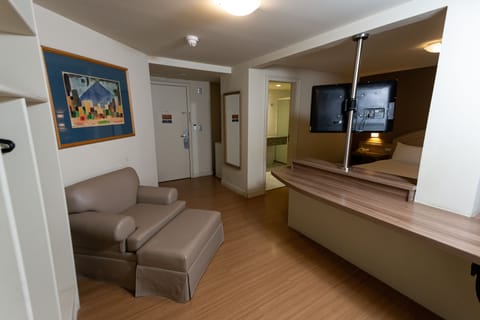 Superior Double Room | Minibar, in-room safe, desk, blackout drapes