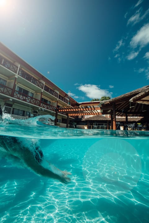 Outdoor pool, pool umbrellas, sun loungers