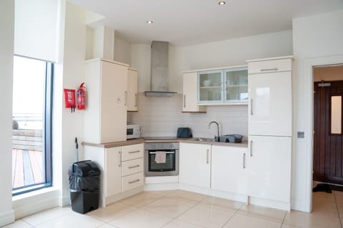 Standard Apartment, 2 Bedrooms | Living area | 40-inch TV with cable channels