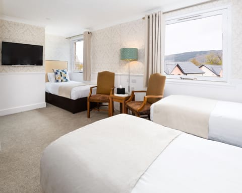 Triple Room | Desk, blackout drapes, iron/ironing board, free WiFi