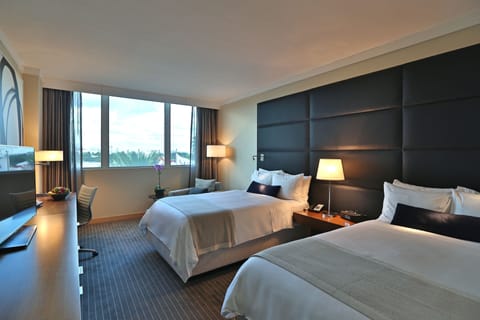 Premium bedding, pillowtop beds, minibar, in-room safe