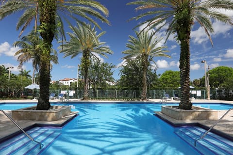 Outdoor pool, open 7:00 AM to 6:00 PM, pool umbrellas, sun loungers