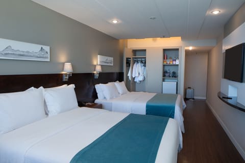 Family Room, Beach View | Pillowtop beds, minibar, in-room safe, individually decorated