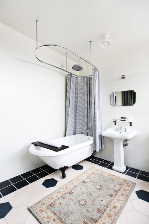 The Suite | Bathroom | Shower, hair dryer, bathrobes, towels