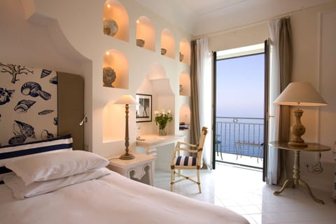 Deluxe Double Room, Balcony, Sea View | Premium bedding, minibar, in-room safe, individually decorated