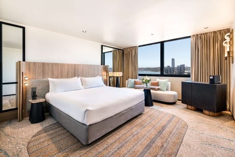 Premier Room, 1 King Bed, River View | In-room safe, desk, laptop workspace, soundproofing