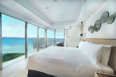 Premium Room, 1 King Bed, Ocean View | In-room safe, desk, laptop workspace, blackout drapes