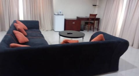 Executive Room | Living area | 32-inch LCD TV with cable channels, TV