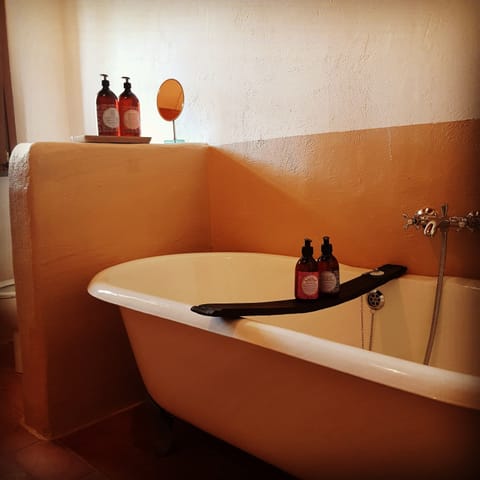 Deluxe Double Room | Bathroom | Separate tub and shower, deep soaking tub, rainfall showerhead