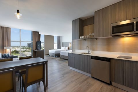 Studio, 2 Queen Beds, City View | Private kitchen | Full-size fridge, microwave, stovetop, dishwasher