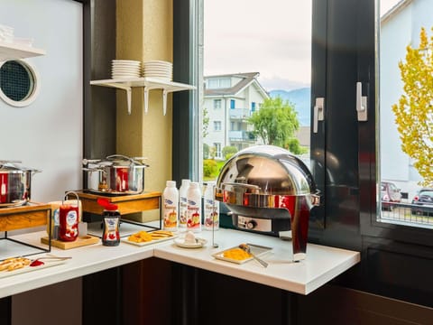 Daily buffet breakfast (CHF 20 per person)