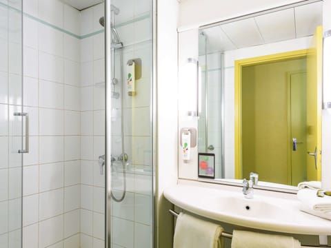 Shower, eco-friendly toiletries, hair dryer, towels