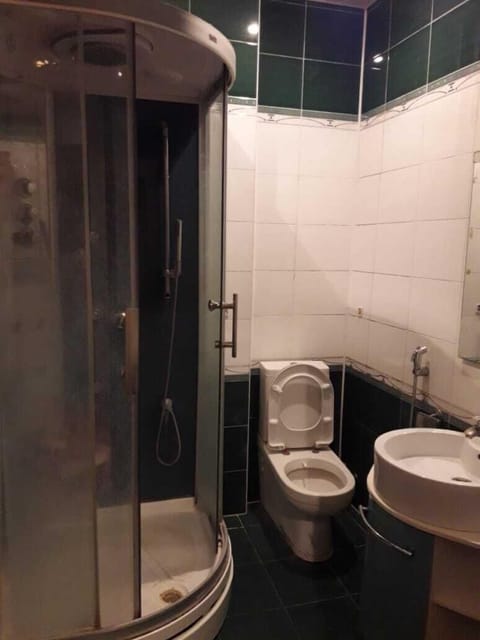 Family Apartment | Bathroom | Separate tub and shower, hair dryer, slippers, towels