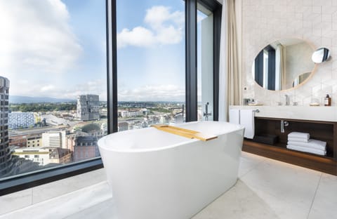 Junior Suite, 1 King Bed | Bathroom | Hydromassage showerhead, eco-friendly toiletries, hair dryer, bathrobes