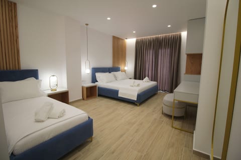 Deluxe Triple Room, Sea View, Beachside | Premium bedding, memory foam beds, minibar, in-room safe