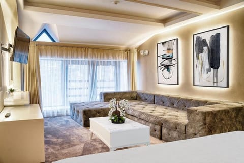 Deluxe Apartment, 2 Bedrooms, Mountain View | Minibar, in-room safe, desk, laptop workspace