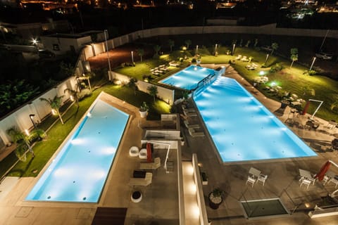 2 outdoor pools, open 8:00 AM to 8:00 PM, pool umbrellas, sun loungers