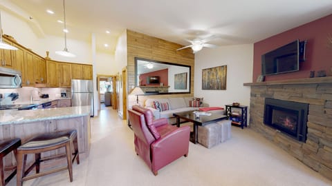 Platinum Room, 2 Bedrooms | Living area | Flat-screen TV, fireplace