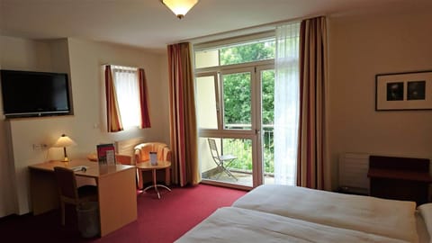 Individually furnished, desk, laptop workspace, blackout drapes