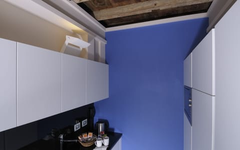 Deluxe Apartment, Annex Building (CORTE) | Private kitchen | Eco-friendly cleaning products