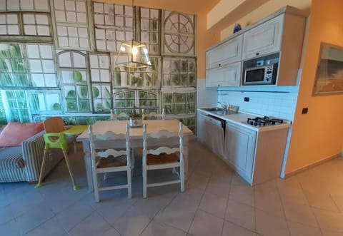 Family Apartment, 1 Bedroom, Sea Facing (Laigueglia Beach) | Private kitchen | Full-size fridge, microwave, oven, stovetop