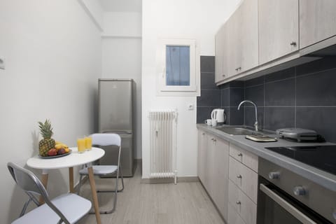 Apartment, 1 Bedroom | Private kitchen | Fridge, microwave, oven, stovetop