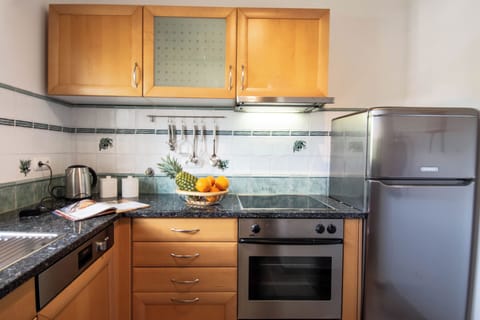 Apartment, 1 Bedroom, Sea View | Private kitchen | Full-size fridge, microwave, stovetop, dishwasher