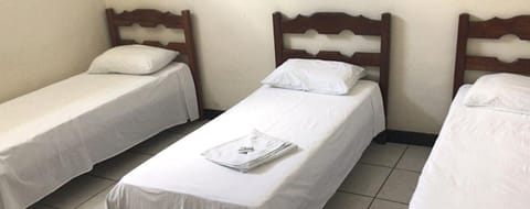 Standard Triple Room | Blackout drapes, free WiFi, bed sheets