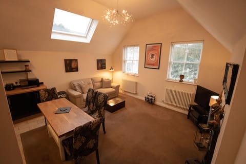 Apartment | Living room | 30-inch TV with digital channels