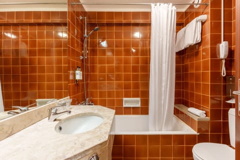 Combined shower/tub, free toiletries, hair dryer, bathrobes