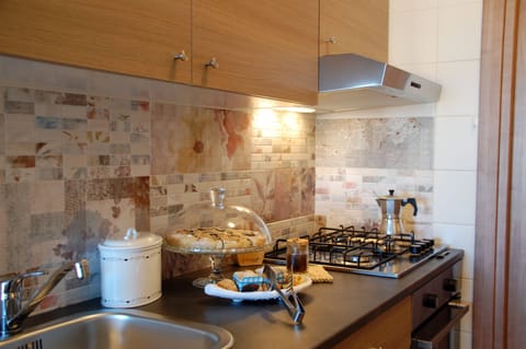 Deluxe Apartment, City View | Private kitchen | Espresso maker