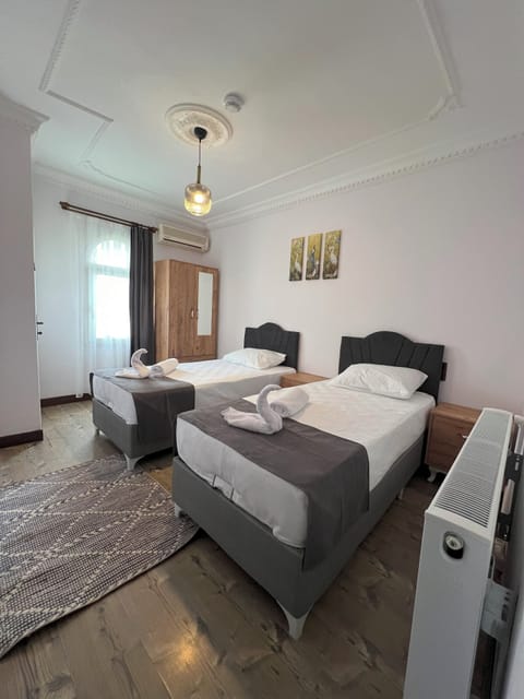 Comfort Double or Twin Room, Balcony | Bathroom | Shower, hair dryer, slippers, towels