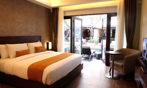 Deluxe Room, Pool Access | 1 bedroom, memory foam beds, minibar, in-room safe