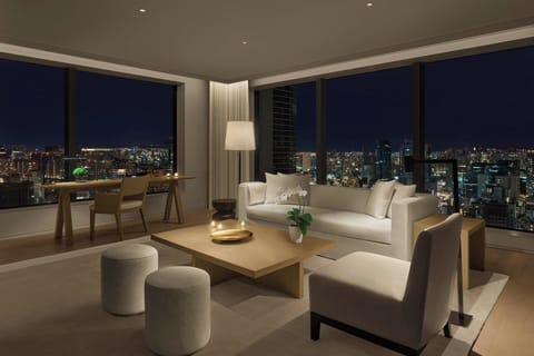 Premier Suite, 1 Bedroom, City View | Living room | Flat-screen TV